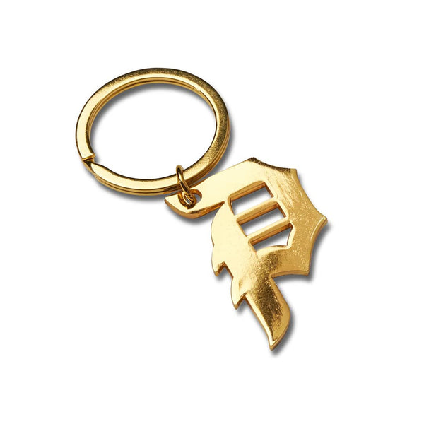 PRIMITIVE | DIRTY P KEYCHAIN. GOLD AVAILABLE ONLINE AND IN STORE AT MOMENTUM SKATESHOP IN COTTESLOE, WESTERN AUSTRALIA.